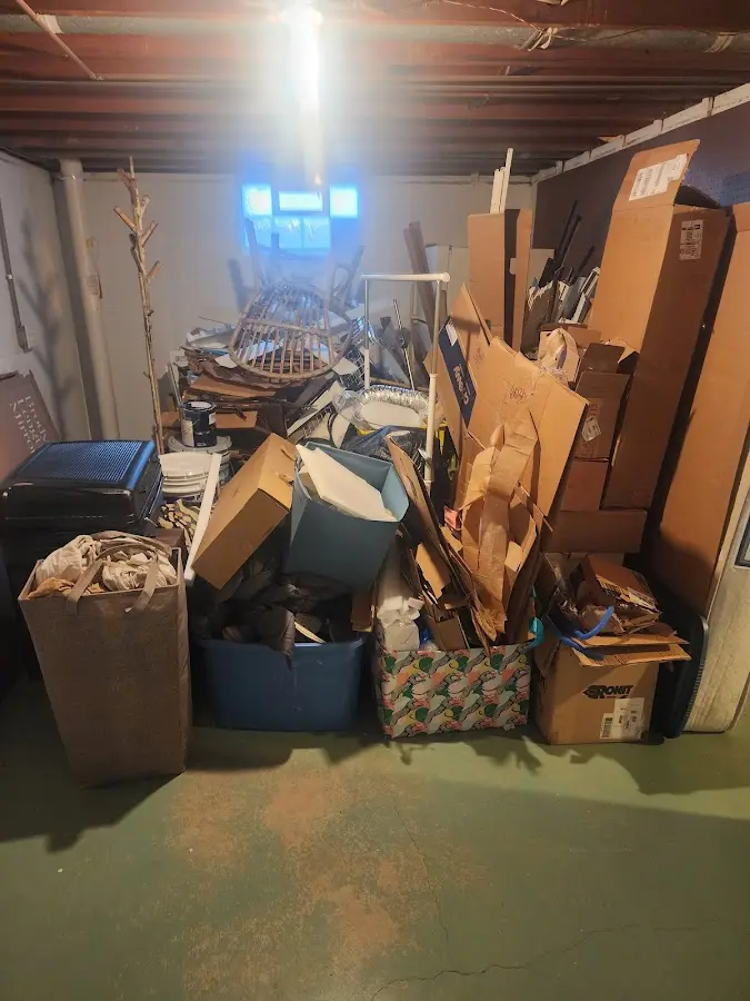 Roll-off dumpster container at job site for Construction Dumpster Rental in South Patrick Shores